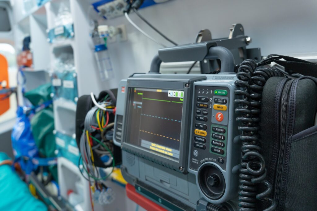 photo of a defibrillator monitor inside an ambulance. stock photography